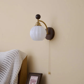 Aurora Dark Wood Brass Wall Sconce