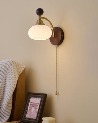 Aurora Dark Wood Brass Wall Sconce