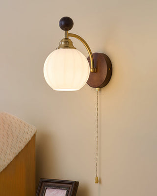 Aurora Dark Wood Brass Wall Sconce
