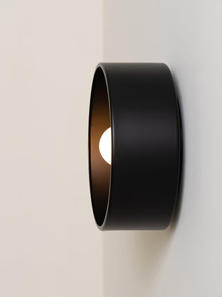 Odis Minimalist Iron Wall Sconce