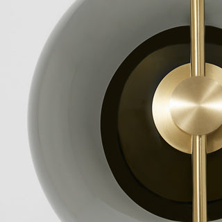 Pendulum Smoked Glass Brass Sconce